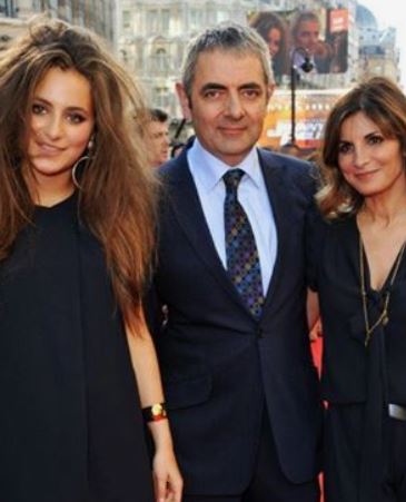 Lily Sastry with her parents Rowan Atkinson and Sunetra Sastry